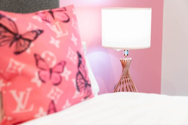 Pink-themed 1-bed apartment refurbishment